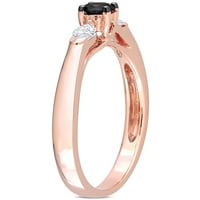 Zaručnički prsten od ružičastog zlata od 10 karata s crno-bijelim dijamantom.